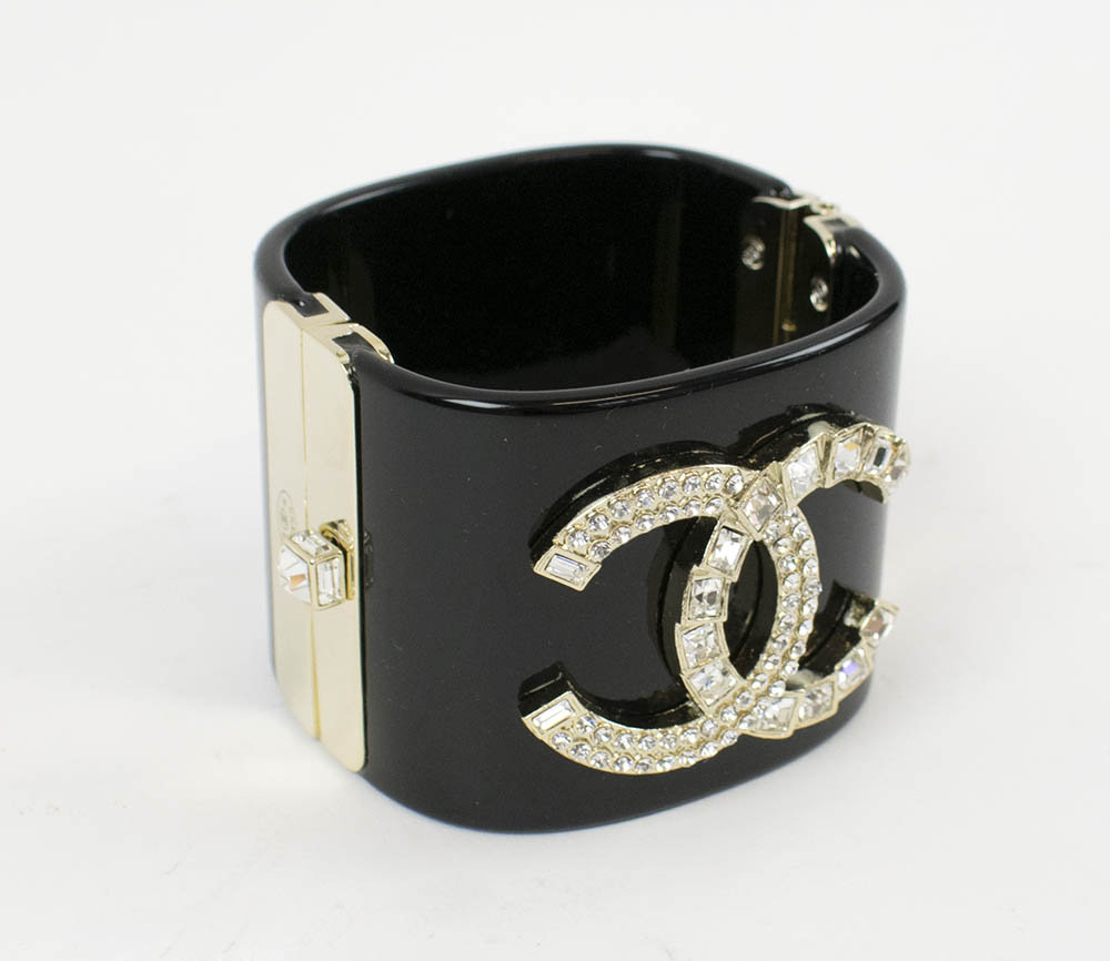 CHANEL CUFF BRACELET, gold toned clasp and hinges, conjoined 'CC' mounted  logo, approx 6cm W x 5cm H.