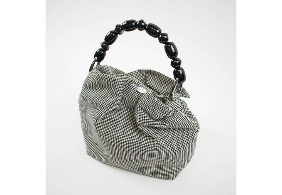 CHRISTIAN DIOR EVENING BAG, with bead black handle, checkered fabric,  magnetic closure at the top, silver tone hardware and bottom feet, 25cm x  20cm H x 7cm with dust bag.