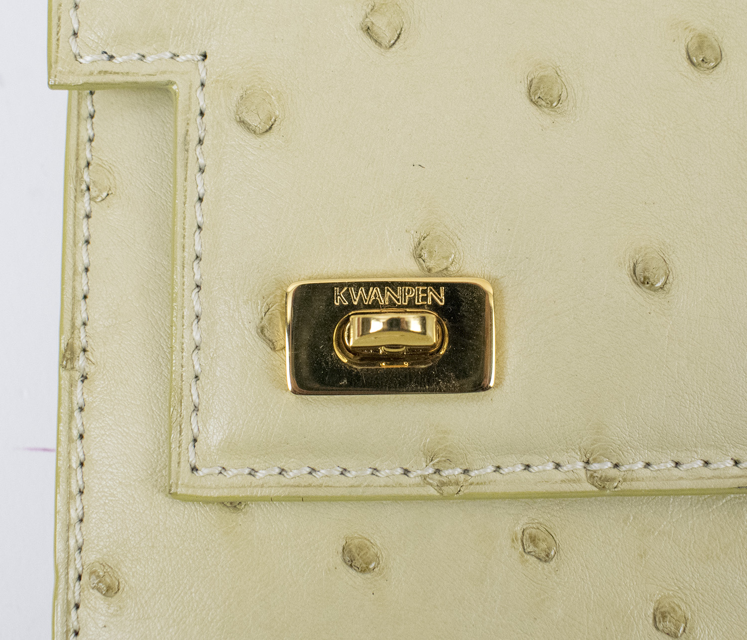 LOUIS VUITTON MONOGRAM VERNIS ROXBURY DRIVE BAG, cream patent leather with  leather trims and detachable shoulder strap, gold tone hardware, snap  closure, light blue/grey fabric lining, 32cm x 17cm H x 11cm.