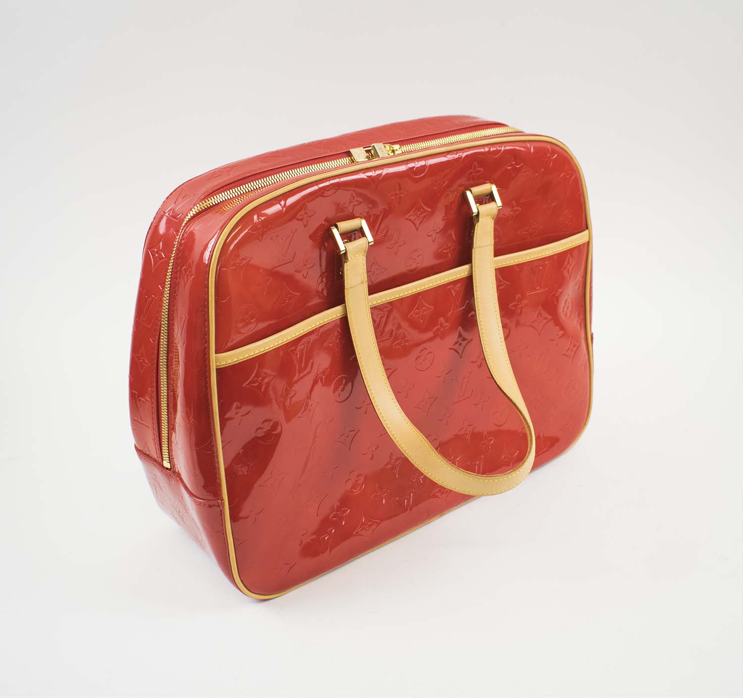 LOUIS VUITTON VERNIS RED MONOGRAM BAG, gold tone hardware, bottom feet,  leather trims and handles, full zip closure, external pocket, red leather  lining, 38cm x 32cm H x 14cm.