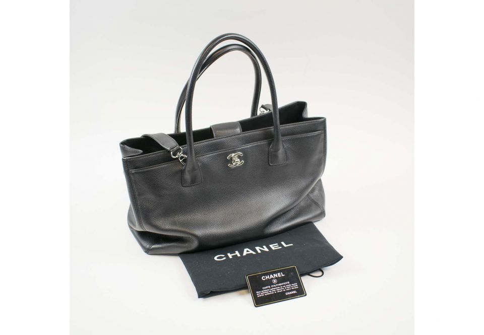 CHANEL EXECUTIVE TOTE BAG, black caviar leather with silver tone hardware,  detachable shoulder strap, two top handles, back and front external pockets  with iconic CC turn lock closure, black snap closure at