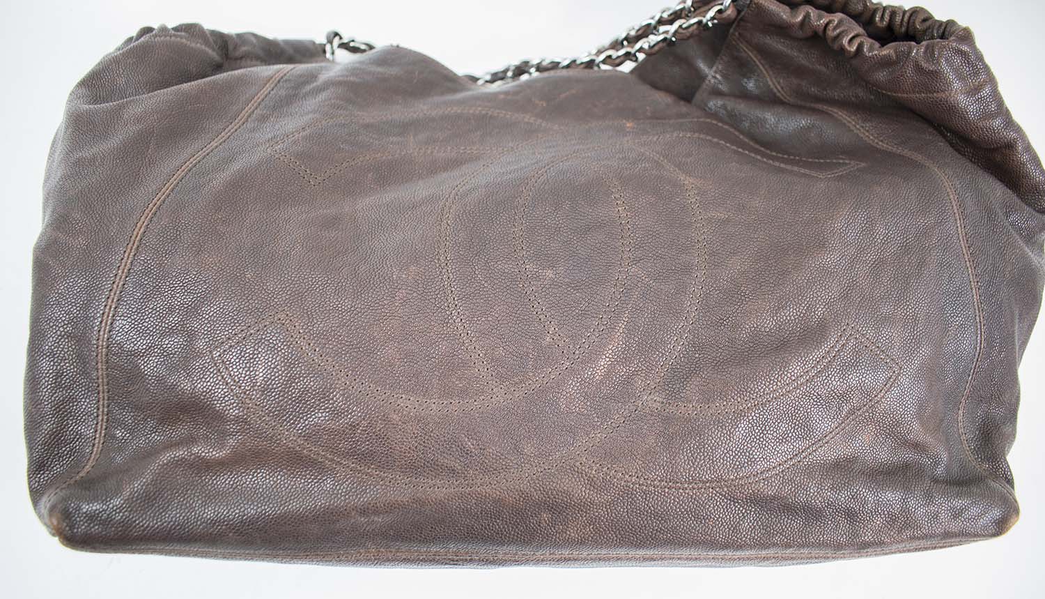 LOUIS VUITTON VINTAGE NOE MONOGRAM BUCKET BAG, leather trims and adjustable  shoulder strap, cord closure, brown fabric lining and brass tone hardware,  26cm x 34cm H x 18cm.