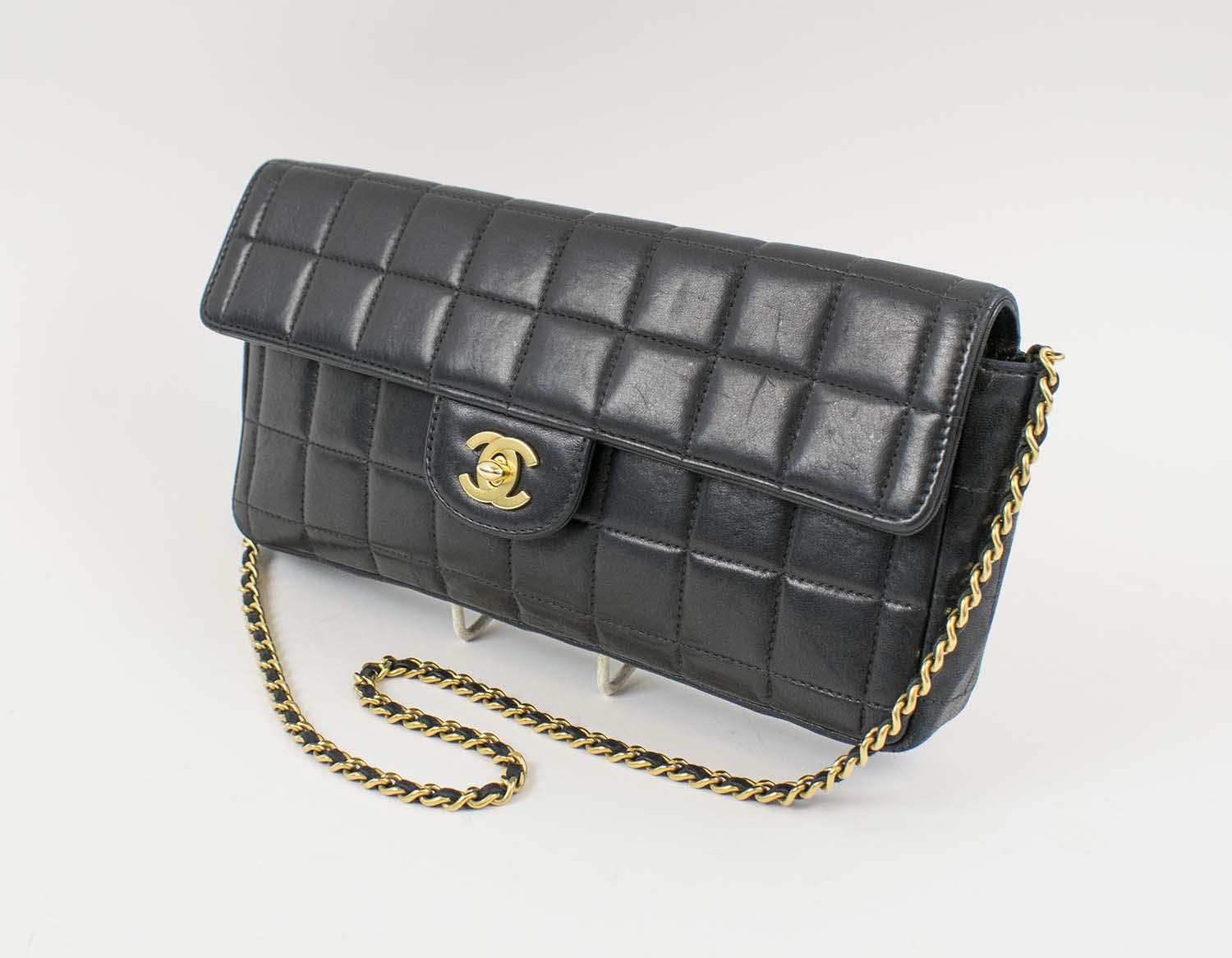 CHANEL VINTAGE FLAP BAG, square quilted leather with brass tone hardware,  chain and leather detachable shoulder strap, matching leather interior, inside  sticker 6692937, 26cm x 13cm H x 4cm.