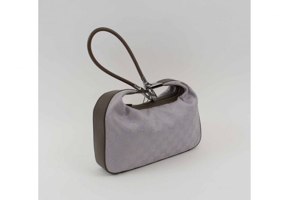 Lot - A vintage Gucci brown suede Hobo bag and Gucci black calfskin  foldover bag