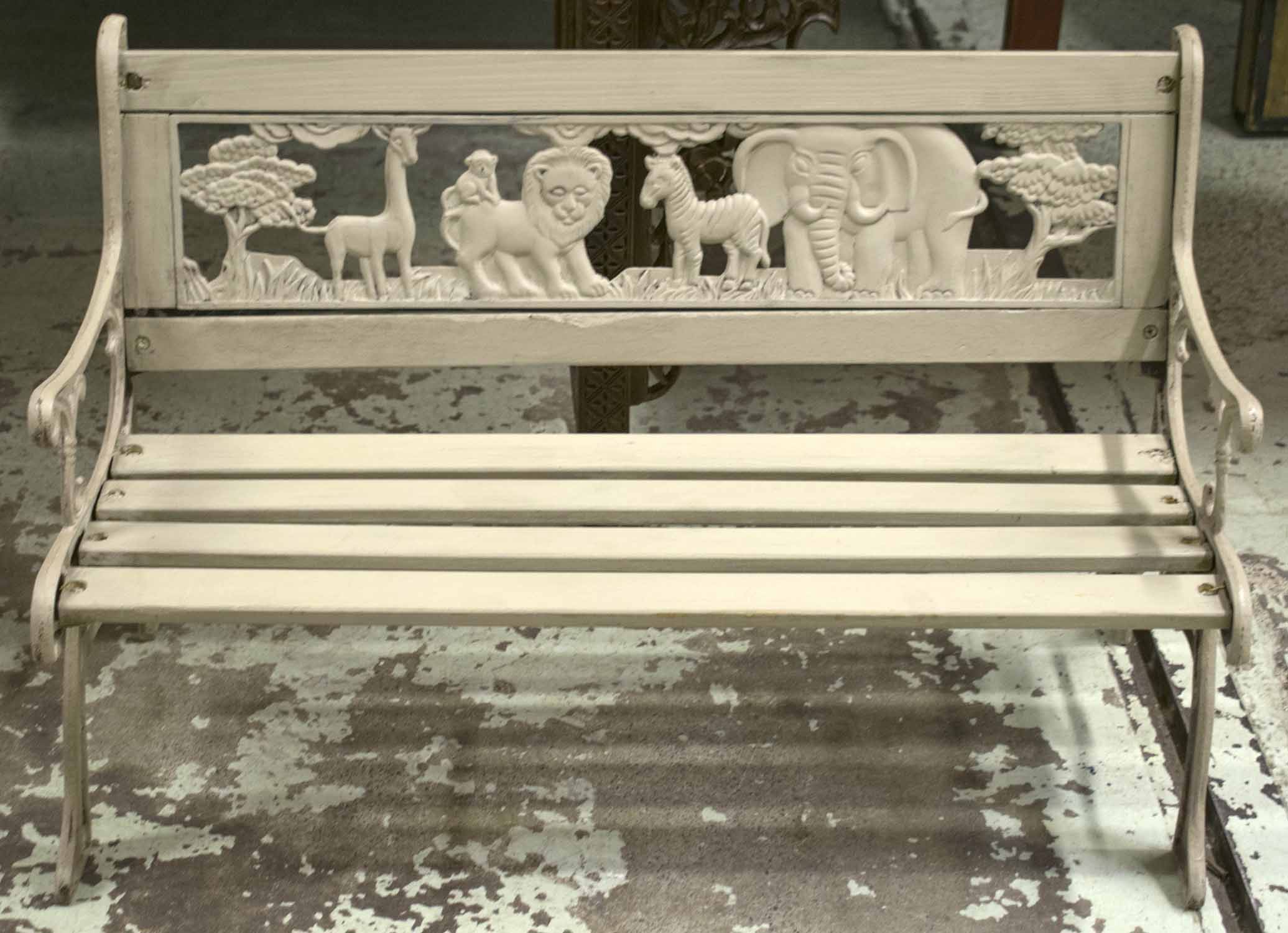 CHILD'S BENCH, grey painted with animal decorated back and cast metal ends,  83cm W x 52cm H.