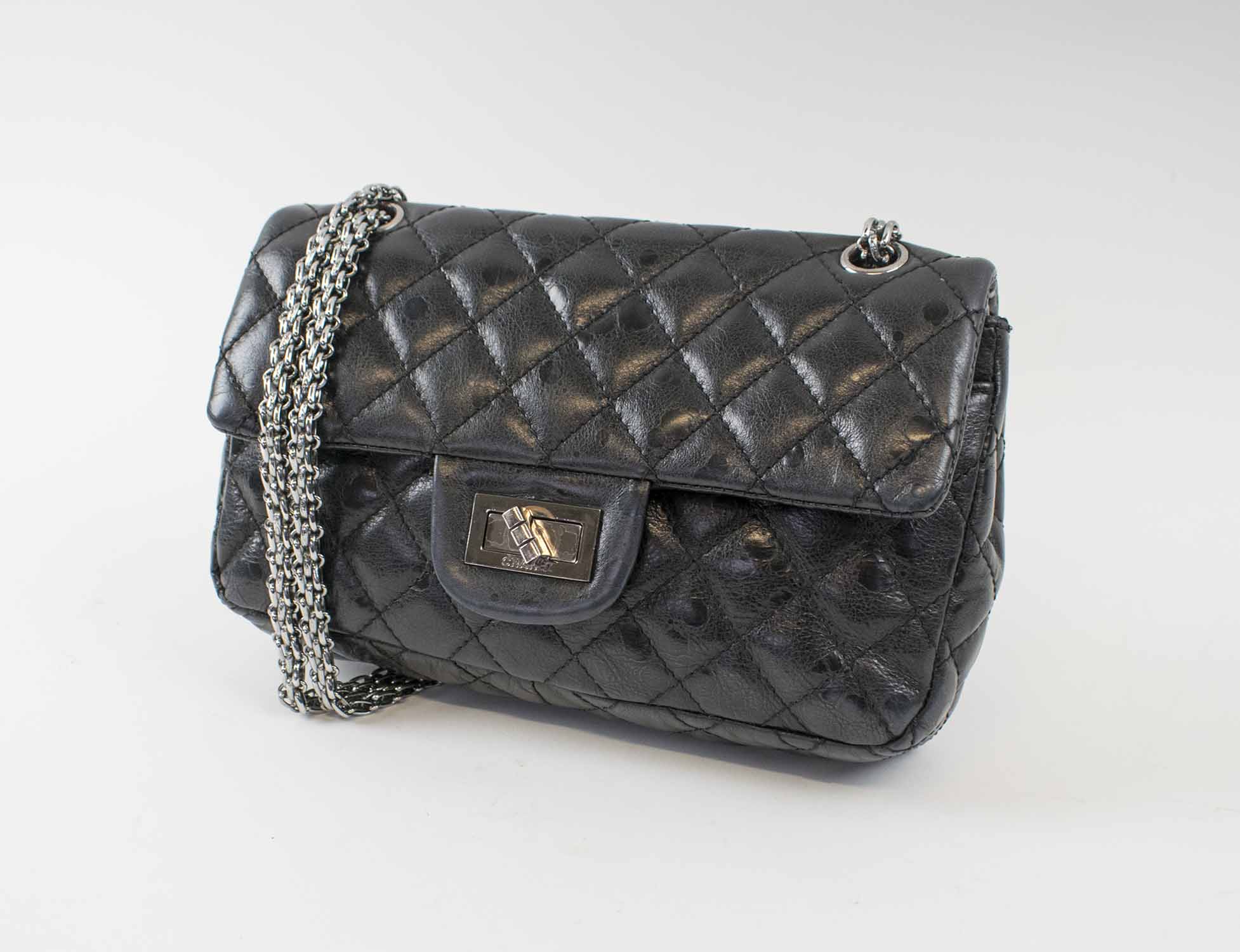CHANEL REISSUE 2.55 DOUBLE FLAP HANDBAG, black leather with black leather  interior, silver tone hardware and chain, inside sticker 11127595, iconic  rectangular mademoiselle lock, 24cm x 16cm.