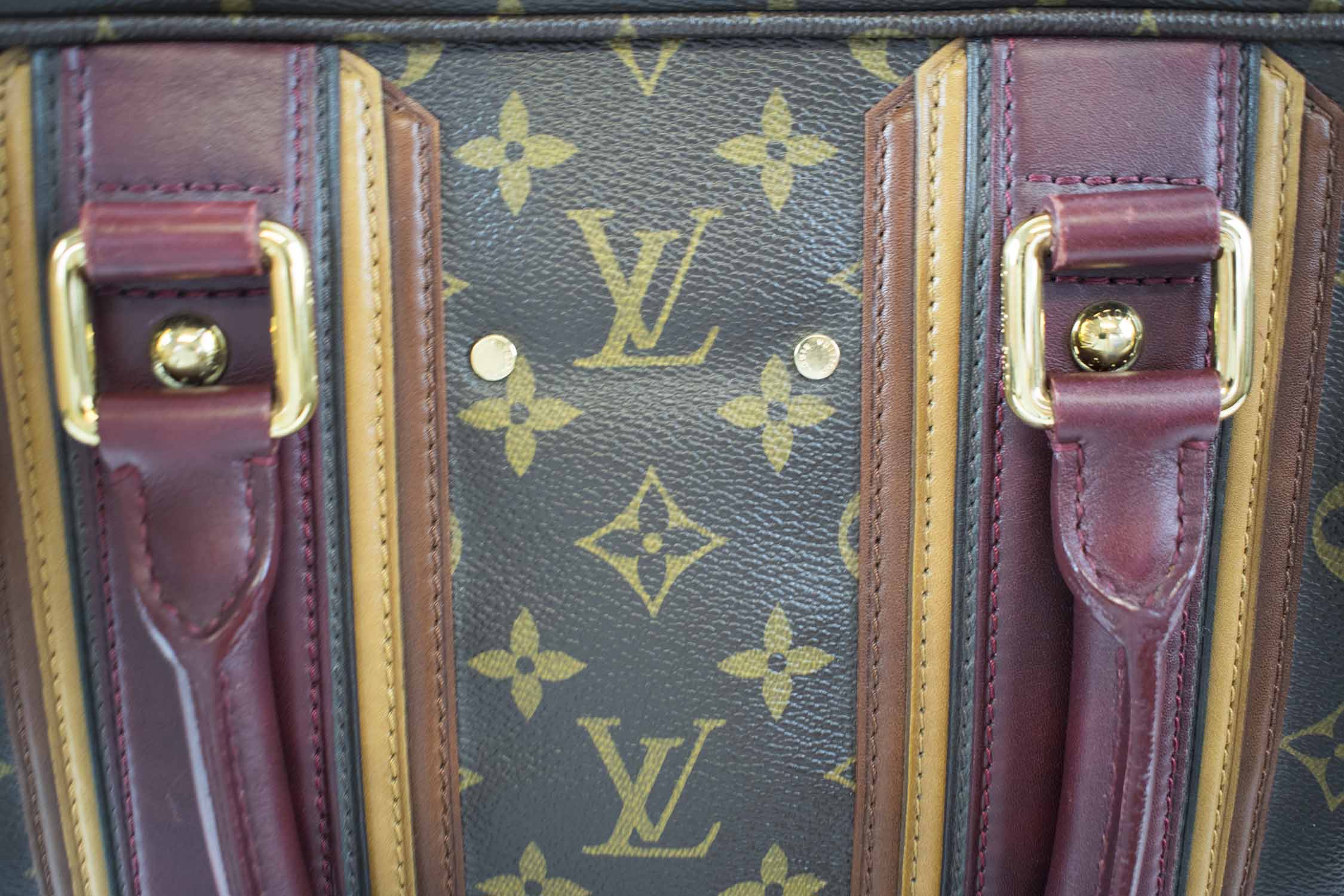 LOUIS VUITTON LTD EDITION MONO TOTE/SHOULDER BAG, monogram canvas, gold tone  hardware, top double zip, two top burgundy leather handles and  adjustable/removable strap with twill fabric lining, with dust bag, 27cm x