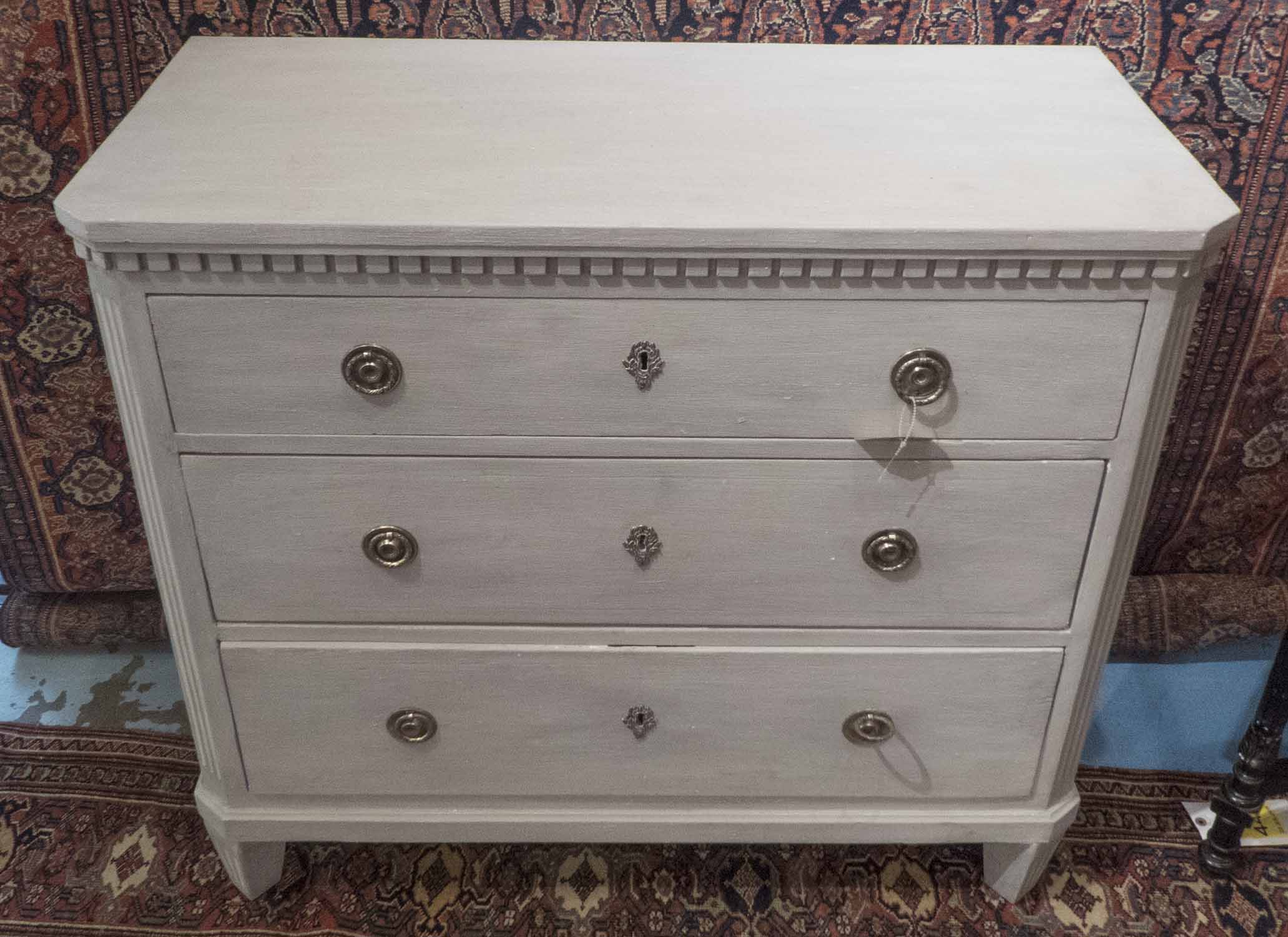 GUSTAVIAN STYLE COMMODE, traditionally grey painted with three long ...