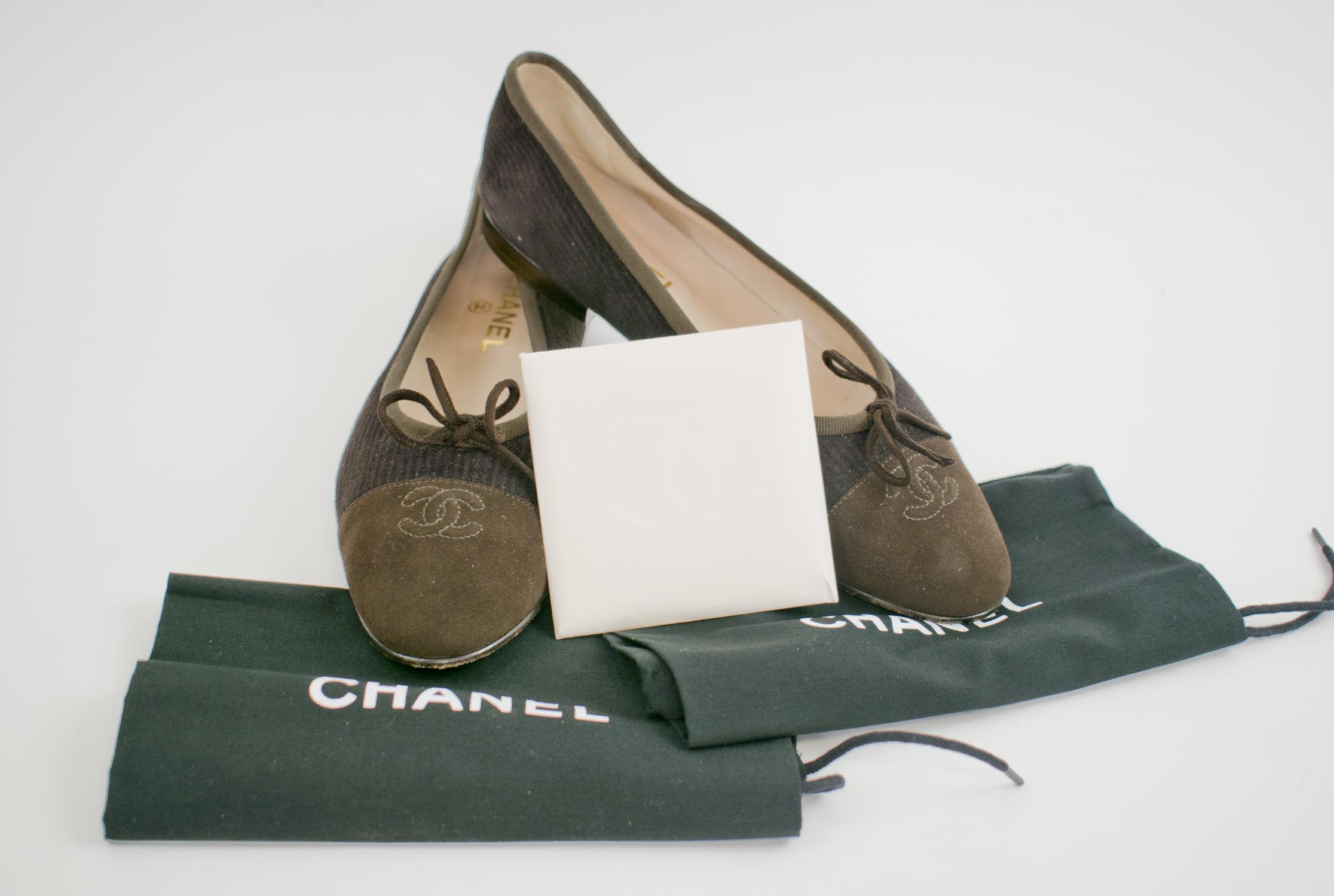 CHANEL BALLERINA FLATS, brown suede with intertwined CC logo at