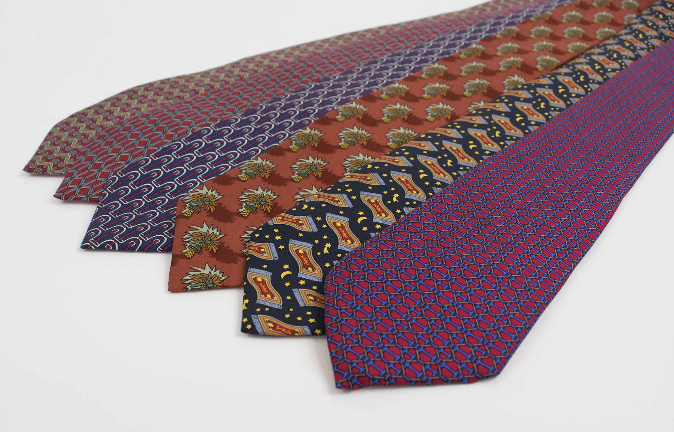 HERMÉS TIES, a collection of six patterned silk ties. (6)