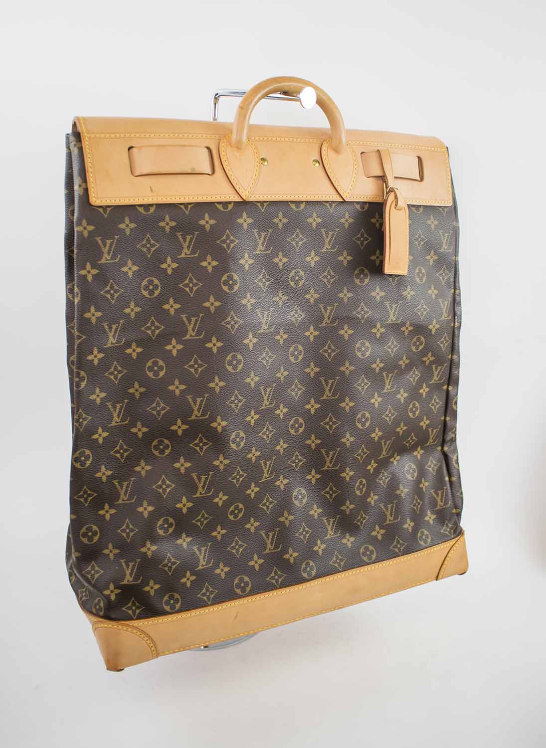 LOUIS VUITTON STEAMER BAG, a collector&#39;s piece, monogram canvas with tan leather base, trims and ...