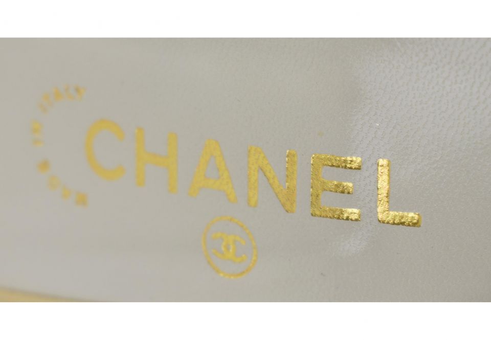 CHANEL MULES, colour latte leather with camel tone toe with iconic  intertwined CC logo at the front and bow, kitten heels 3cm, size 41 (8Uk).