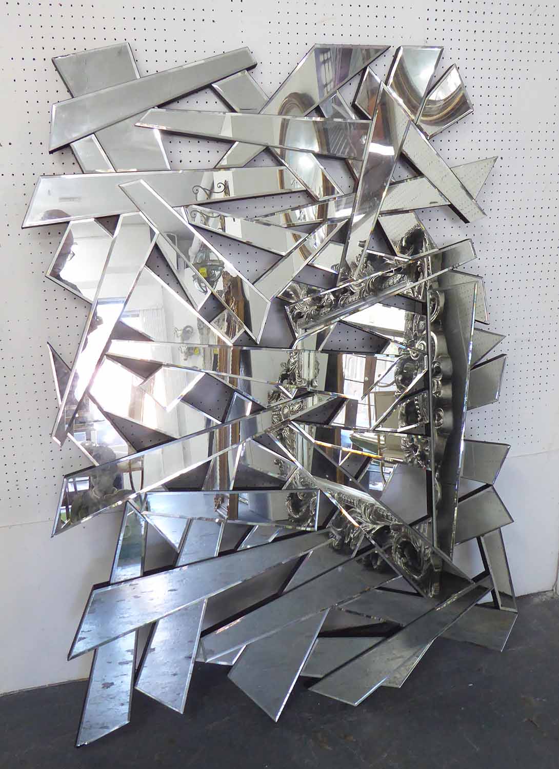 WALL MIRROR, of abstract geometric form, 100cm x 141cm. (with faults)
