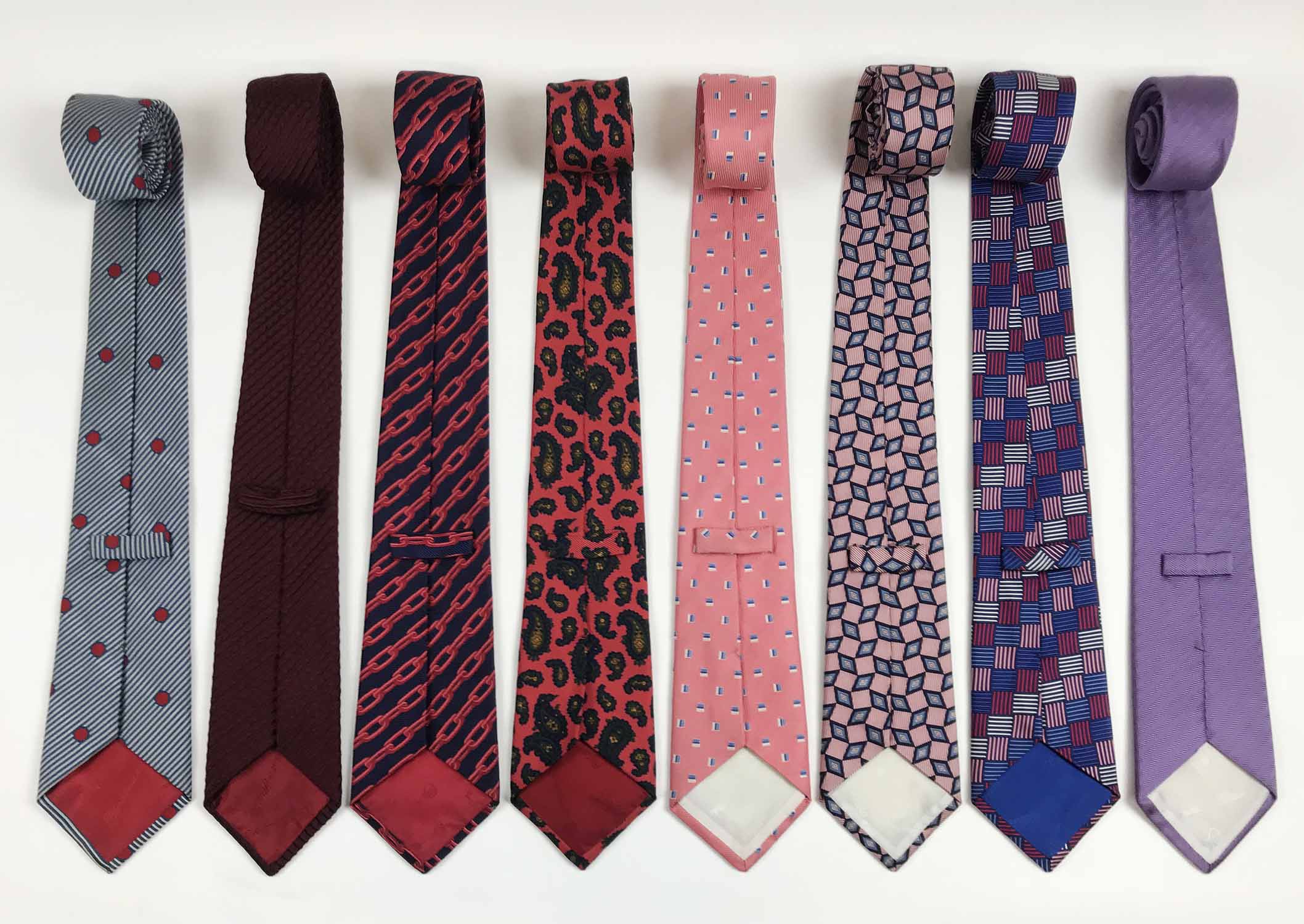 TURNBULL & ASSER TIES, a collection of eight patterned silk ties. (8)