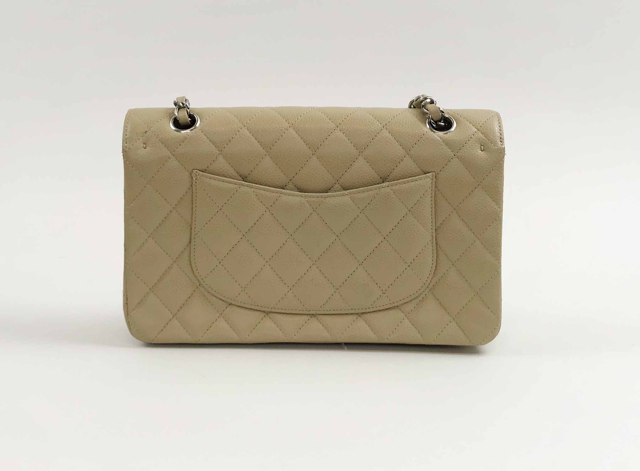 CHANEL CLASSIC FLAP BAG, with front double flap closure, iconic quilted  pattern and silver hardware, chain and leather shoulder strap, matching  leather interior, interlocked C lock, 25cm x 7cm x 15cm H