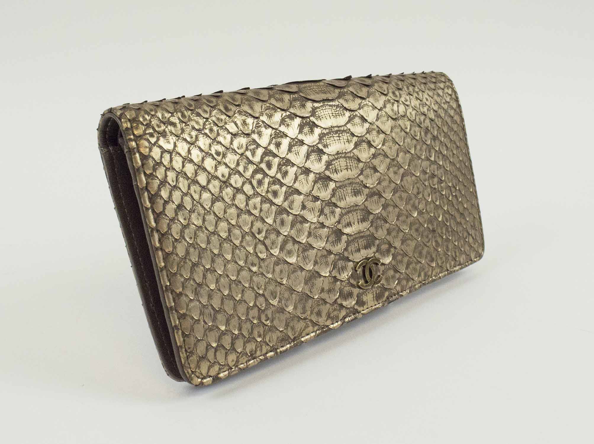 CHANEL METALLIC PYTHON LONG WALLET, a long checkbook pocket, eight card  slots, one zippered and five other compartments, back pocket, front CC  logo, with dust bag, 19cm x 10cm.