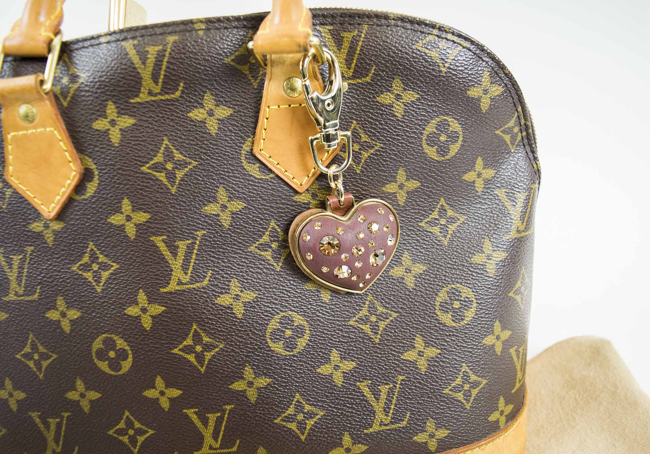 Sold at Auction: Louis Vuitton, Louis Vuitton Key Chain With Charms