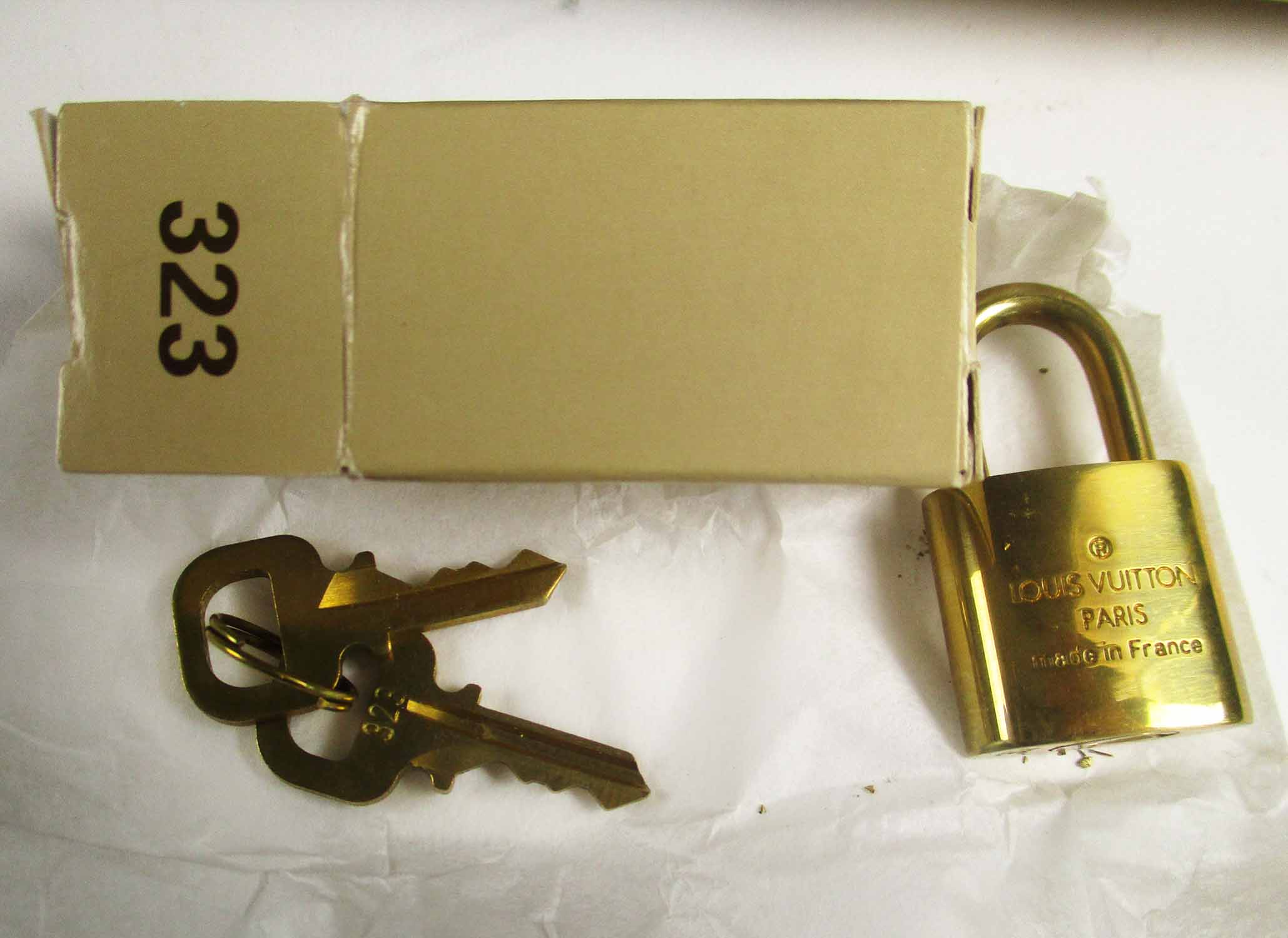 LOUIS VUITTON 'SIRIUS 70' MONOGRAM SUITCASE, plus padlock and keys, matches  lot no. 519. (owner's monogram)