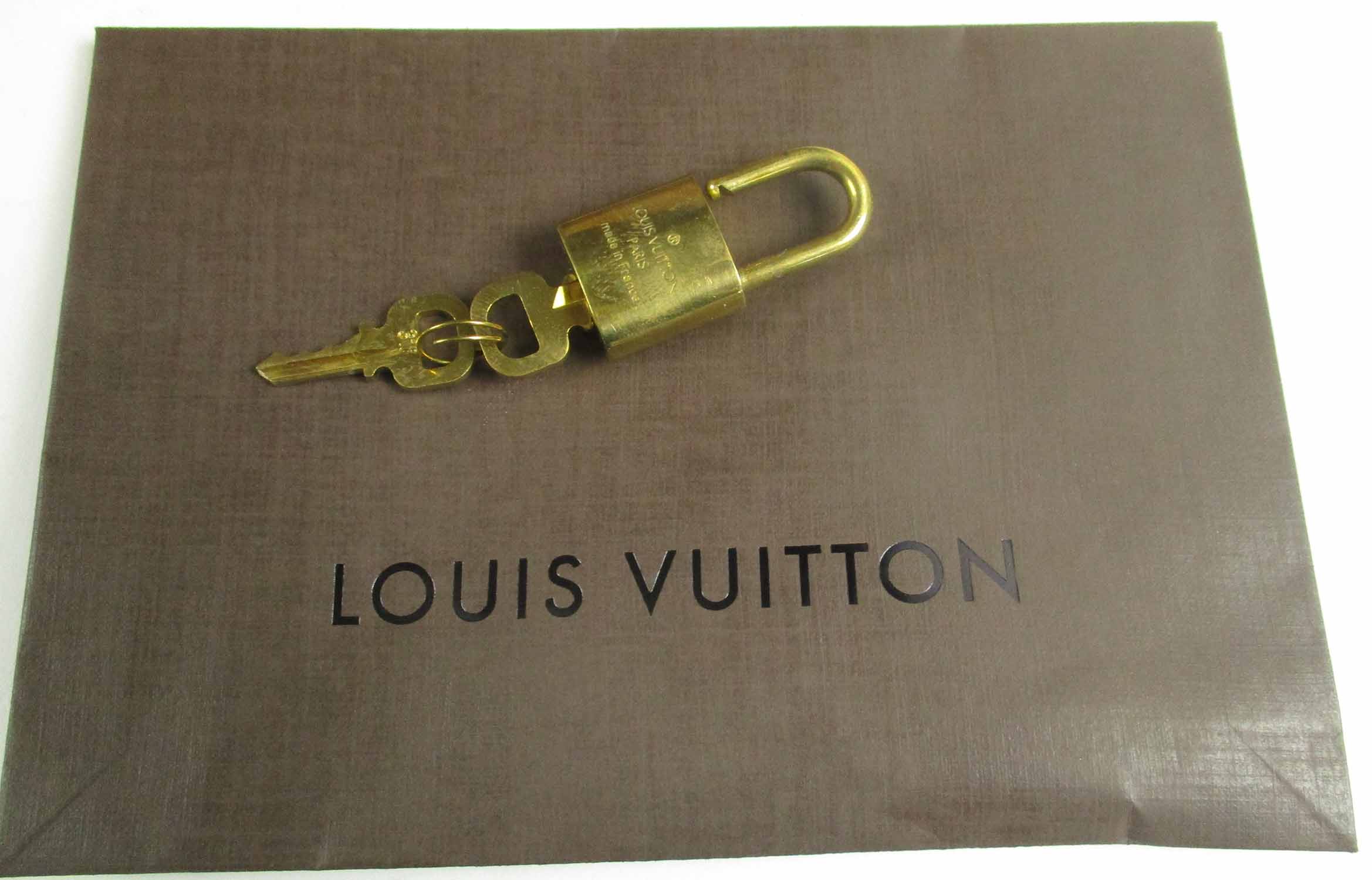 LOUIS VUITTON 'SIRIUS 70' MONOGRAM SUITCASE, plus padlock and keys, approx  72cm L, 50cm H. (unused)
