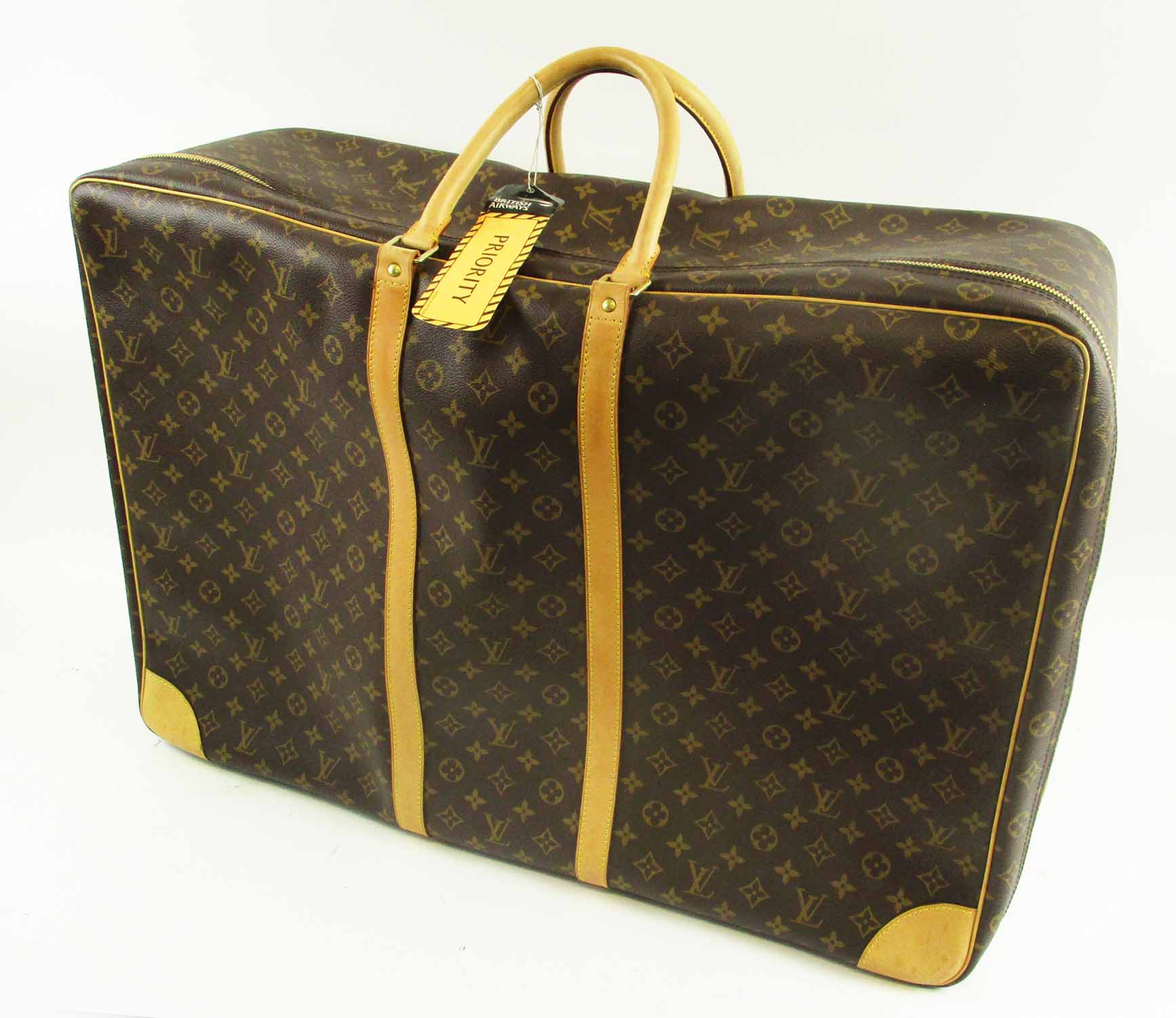 Sold at Auction: Louis Vuitton Monogram Sirius Suitcase 65
