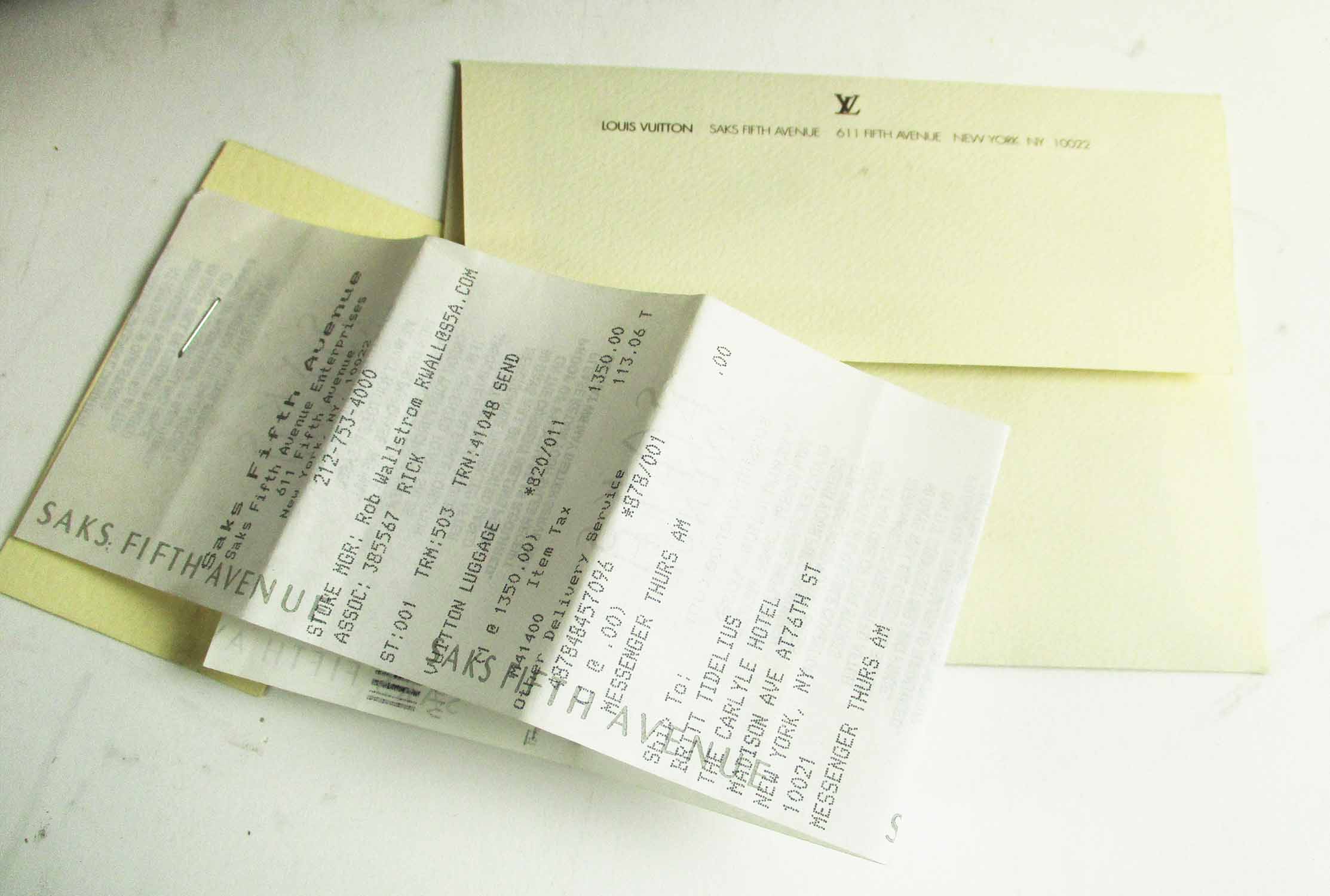 LOUIS VUITTON 'SIRIUS 70' MONOGRAM SUITCASE, plus original 'Saks Fifth  Avenue' bill of sale.