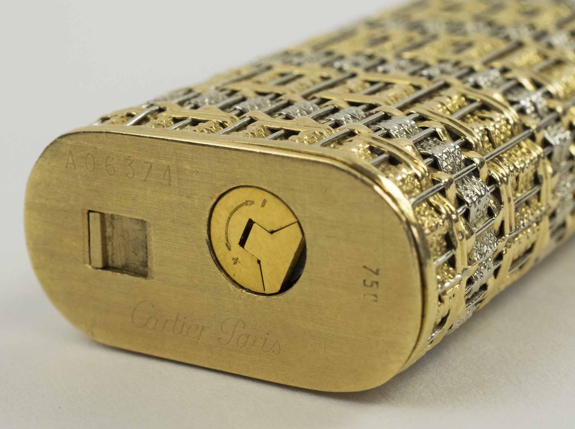 18CT TWO GOLD CARTIER LIGHTER, with diamond clasp numbered A06374.
