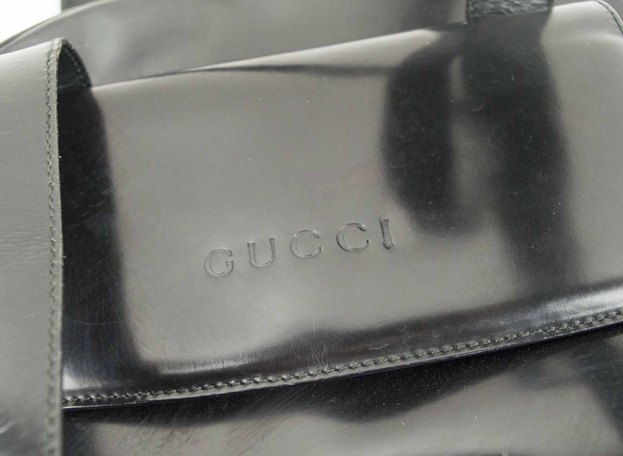 GUCCI VINTAGE BAG, suede and leather with gold tone hardware and iconic GG  pull tab, monogram lining with dust bag, 27cm x 15cm H and another vintage  Gucci, black leather with front