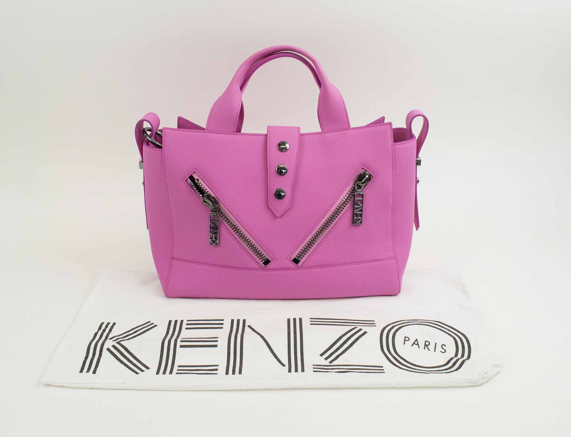 KENZO KALIFORNIA SHOULDER/BAG, in pink gommato waterproof leather, frontal flap  closure with two frontal zips pocket and a further pocket at the back, gun  metal tone hardware, with dust bag, with adjustable
