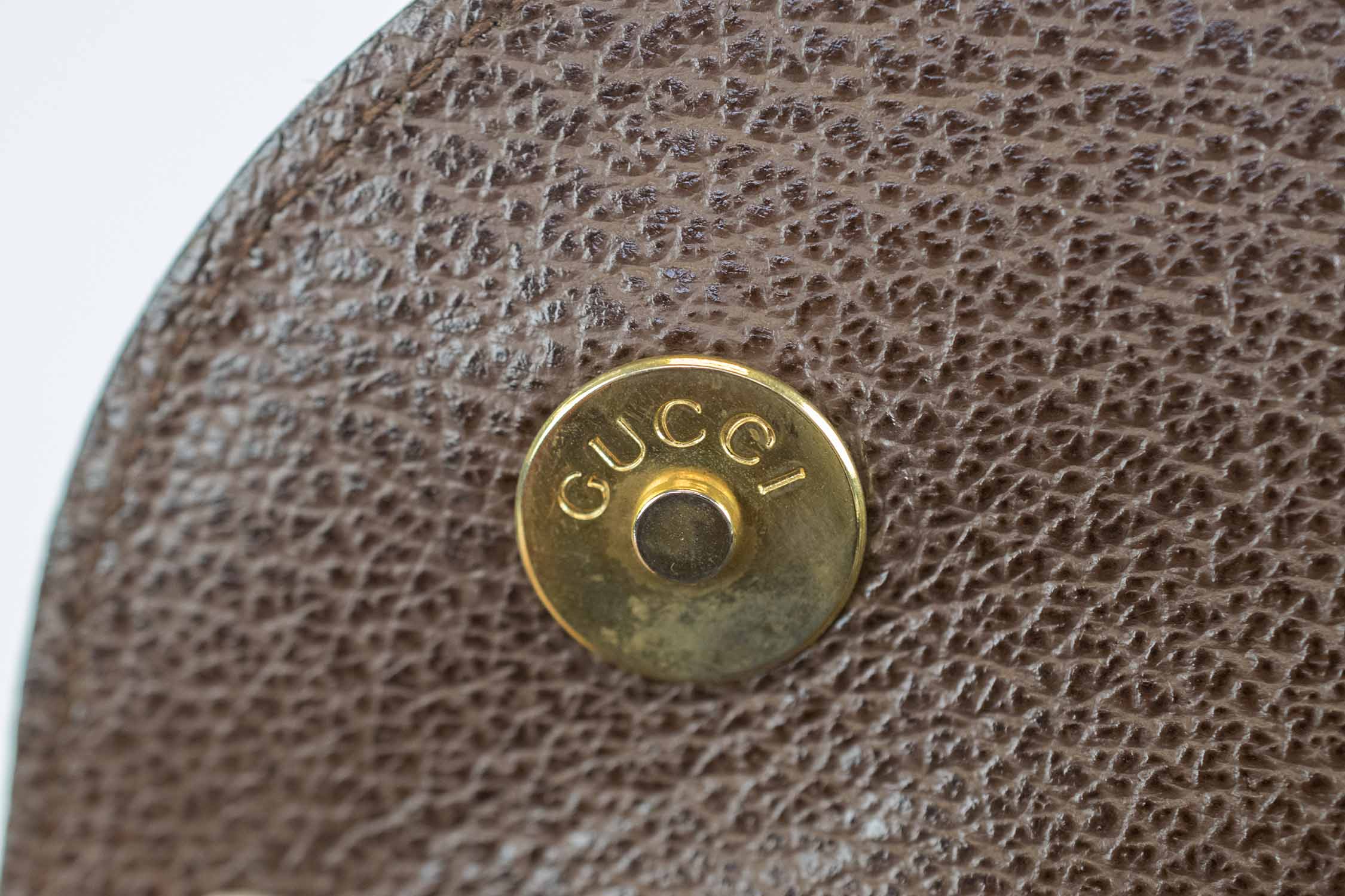 GUCCI VINTAGE SADDLE BAGS, with equestrian stirrup charm, one brown leather  and suede 30cm x 23cm H x 12cm, the other black leather 20cm x 18cm H x 6cm  both with adjustable
