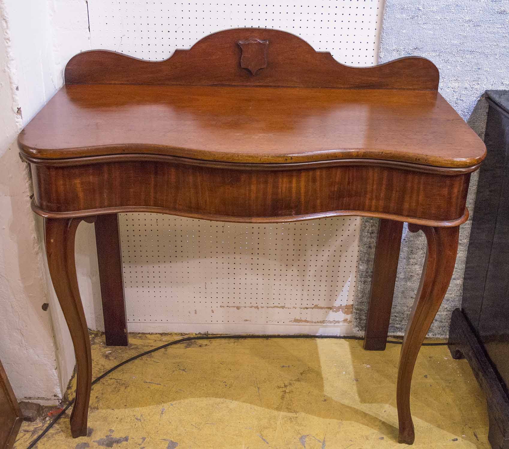 CONSOLE TABLE, Victorian mahogany serpentine fronted with a raised