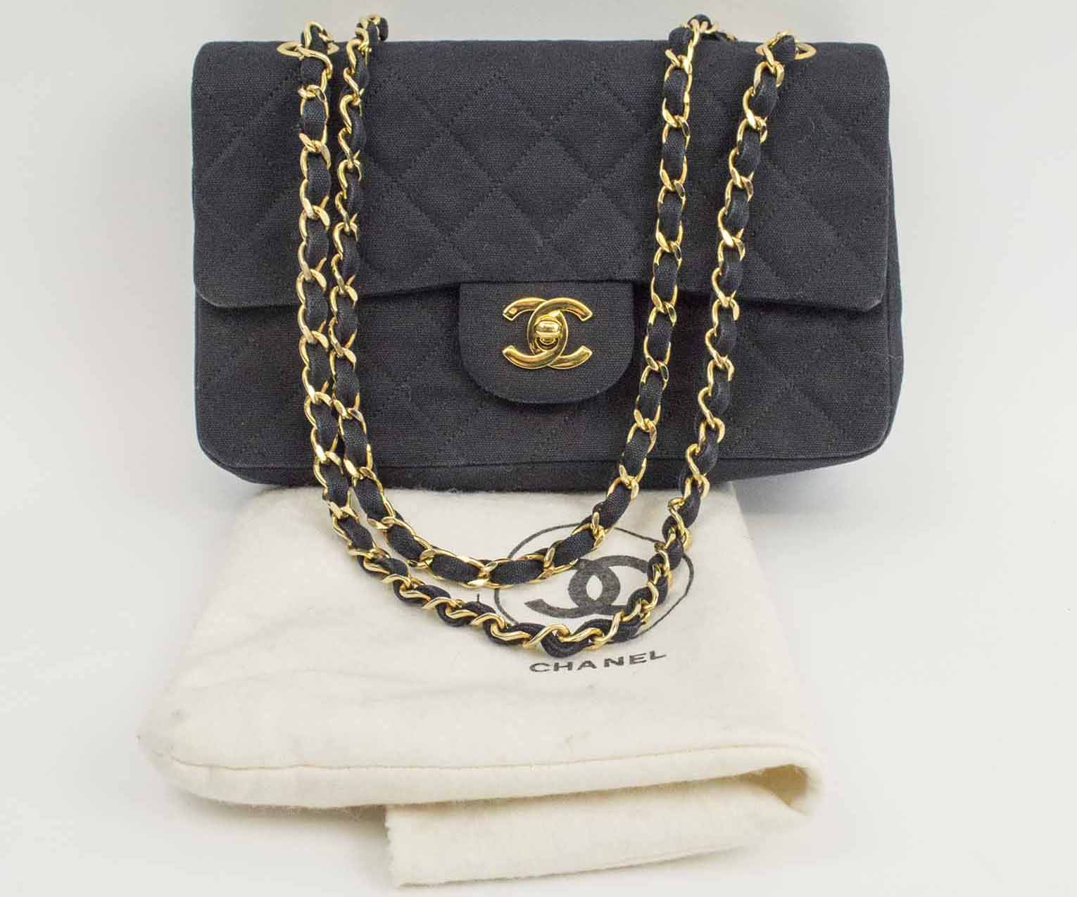 CHANEL CLASSIC FLAP BAG, black fabric with iconic burgundy leather lining,  gold tone hardware, sticker 1689505 1989/1991, 23cm x 14cm H x 6cm, with  dust bag.