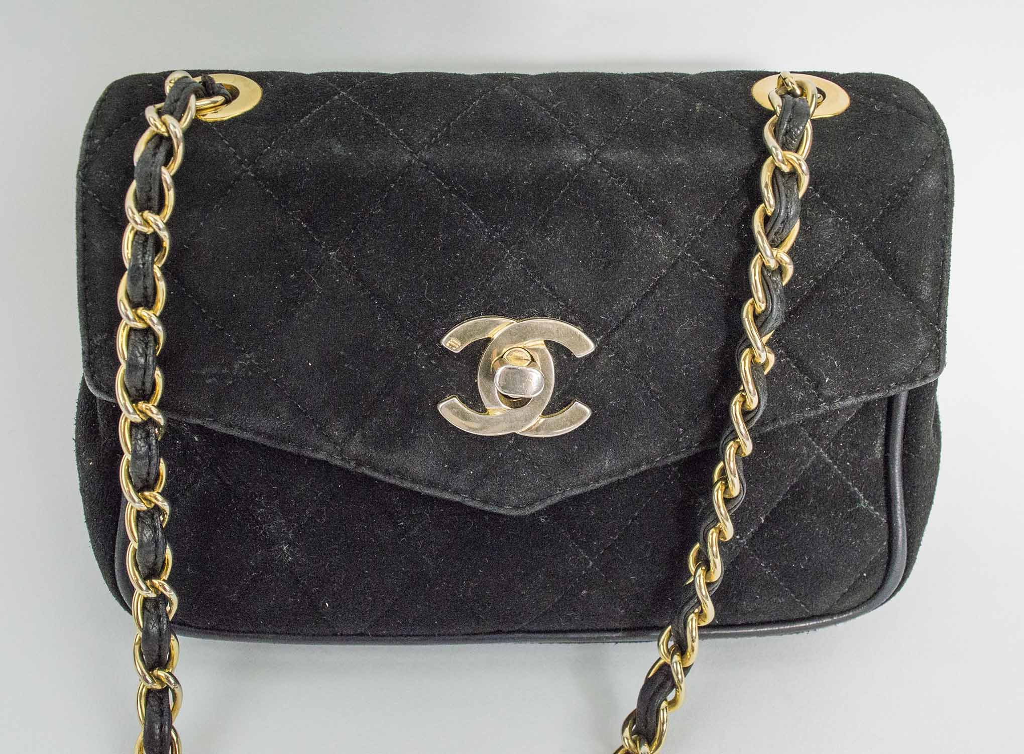 CHANEL VINTAGE SHOULDER/CROSSBODY BAG, iconic diamond quilted black suede  with matching leather interior, interwoven leather and chain strap, 17cm x  11cm H x .