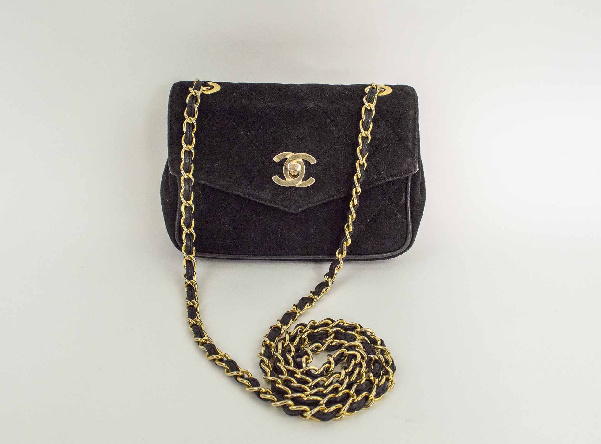 CHANEL VINTAGE SHOULDER/CROSSBODY BAG, iconic diamond quilted black suede  with matching leather interior, interwoven leather and chain strap, 17cm x  11cm H x .