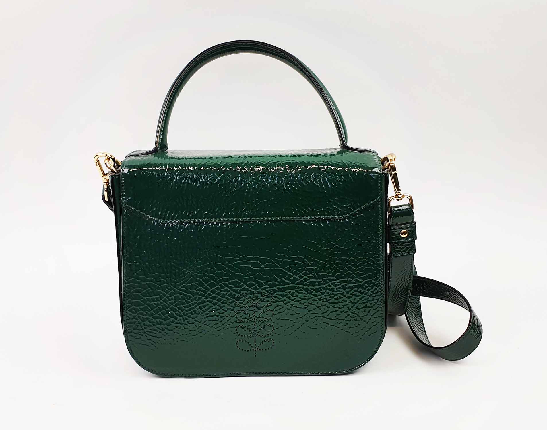 ORLA KIELY HANDBAG, patent green leather with snap front closure, fabric  lining and gold tone hardware 26cm x 22cm H x 11cm, together with matching  necklace and brooch, plus a Moschino zippered