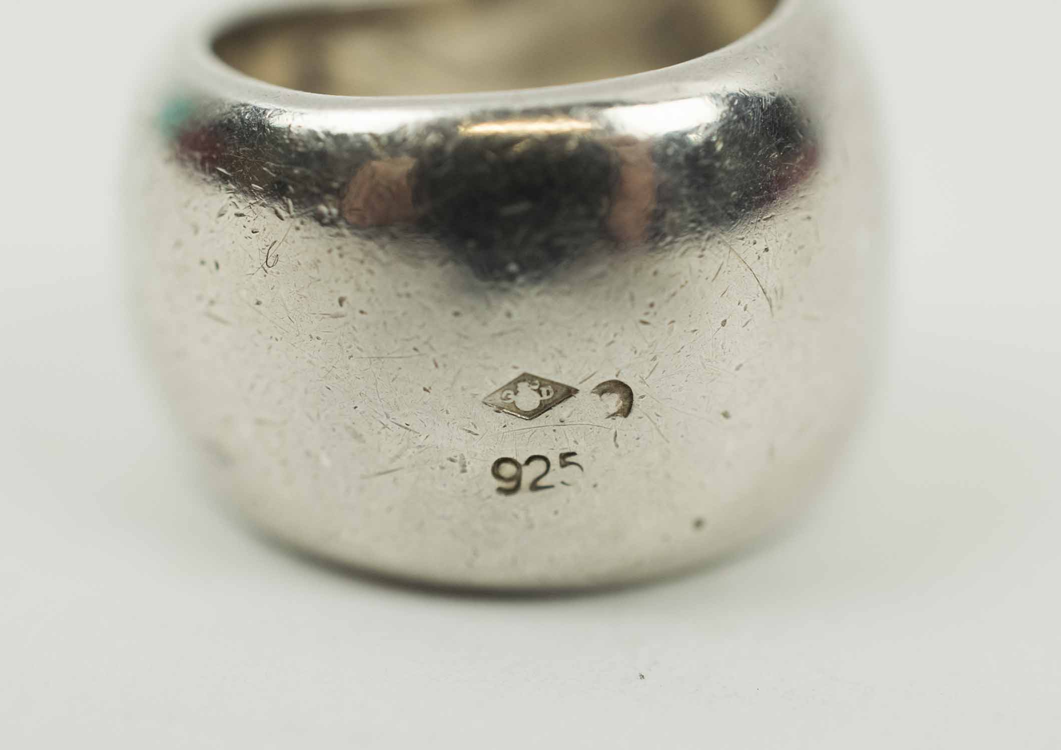 CHANEL STERLING SILVER RING, of chunky design and stamped 'CHANEL' to top,  weight gross 17grams, marked 925 and Chanel lozenge mark/stamp to bank of  shank.